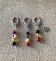 Protection pet gemstone collar charm, purse accessory featuring an evil eye.