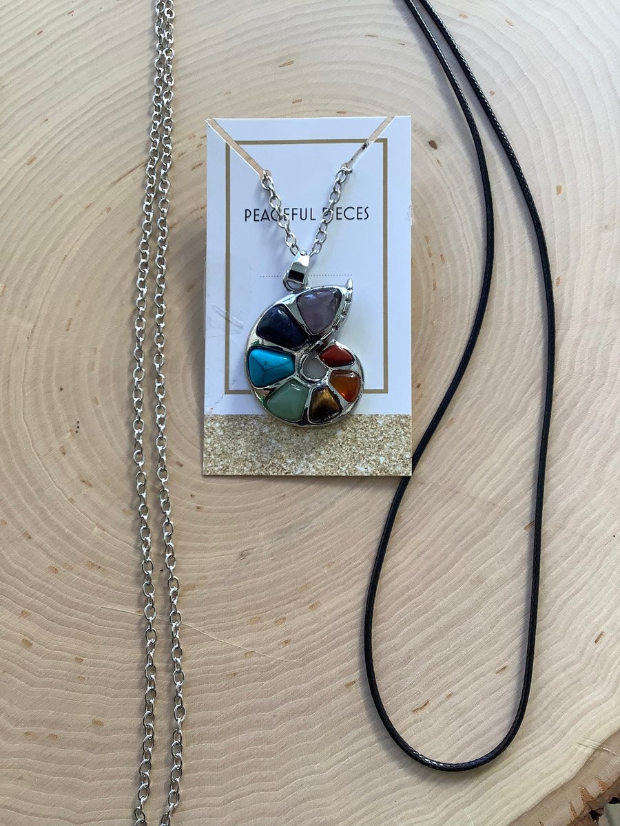 Healing chakra stone nautical shell necklace,pendant, with a 28” silver chain along with a 20-22” adjustable black cord.