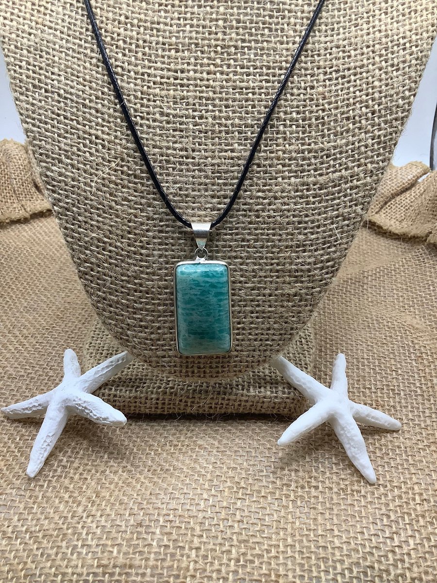 Healing Amazonite pendant known for its properties to help with health, protection,vitality,confidence, happiness, and calmness.