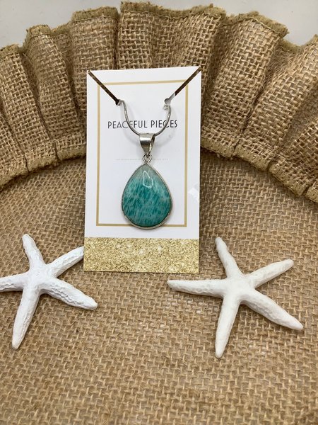 Healing Amazonite pendant known for its properties to help with health, protection,vitality,confidence, happiness, and calmness.